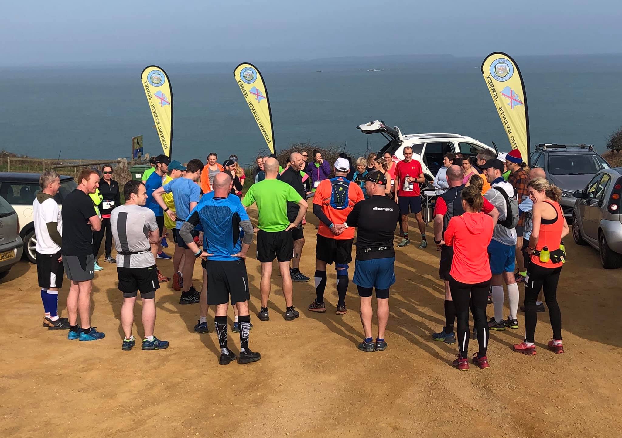 Trail Monkey runners gathering before a coastal trail race